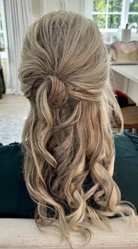 Half-up curled blonde hairstyle for special occasion in Tuscaloosa